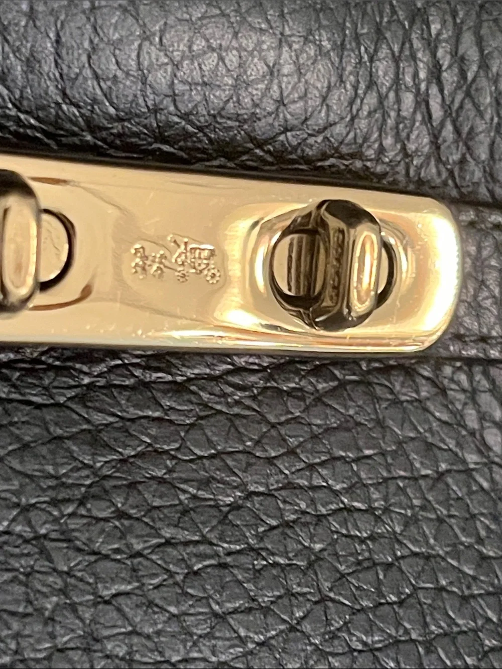 Metallic blue Coach crossbody purse